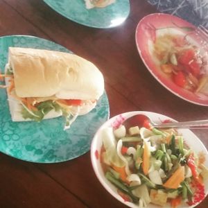 Tofu burger and a mixed veg dish at Number One Vegetarian in Bangkok
