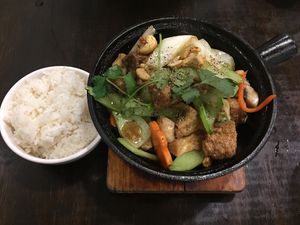 Clay pot with tofu, mock chicken and vegies with rice on the side at Huong Viet in Footscray