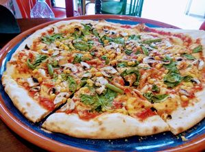 vegan pizza at Crustys Pizzeria  in Mallorca