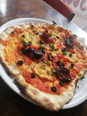 Vegan Hummus pizza...strange but tasty at Crustys Pizzeria  in Mallorca