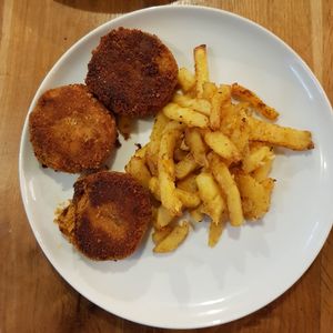 Vegan buckwheat patties with fries at VegeQuchnia in Opole