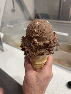 Single scoop of their rocky road ice cream on a cake cone  at Hug Life in Garden Grove