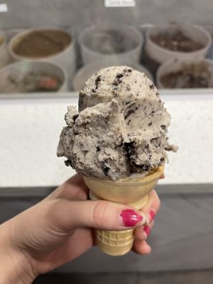 Single scoop of their cookies and cream ice cream on a cake cone  at Hug Life in Garden Grove