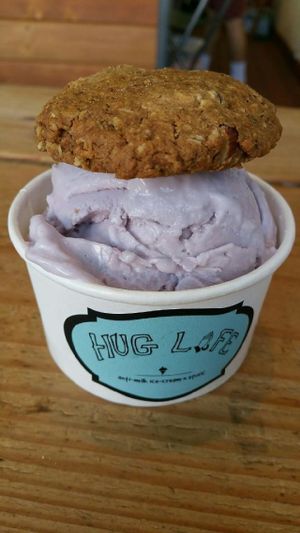 One scoop of Taro Ice Cream... Cookie on top - special on the house! at Hug Life in Garden Grove