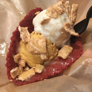 pumpkin spice and vanilla ice cream with cinnamon crunch cereal in a red velvet taco. + coconut condensed milk  at Hug Life in Garden Grove