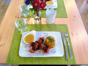 Almond tofu skewers with three quinoa and peanut butter sauce at AVeganTisch in Neunkirchen Am Sand