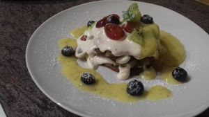 Glutenfree bookwheat pancakes with almond cream and fresh fruits at AVeganTisch in Neunkirchen Am Sand