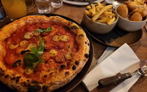 Marinara pizza, fries and vegan garlic dough balls at Crust  in Liverpool