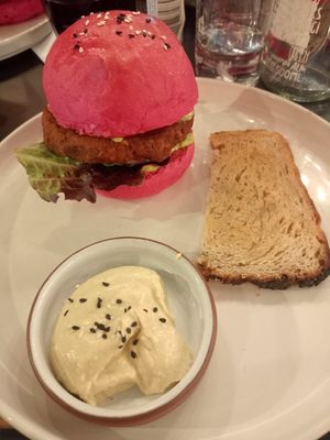 Happy vegan Burger with hummus and toast instead of fries. at Scheckter's Raw in Cape Town