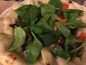 Pizza with artichoke and spinach at Vegan Express in South West London