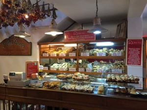 Counter with breads behind it at Madre Tierra in San Salvador De Jujuy