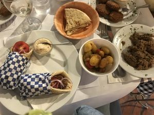 Falafel gyro, papas de la casa y babaghanoush  at Del Griego in Guatemala City