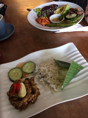 Rendang with ‘purple’ rice. Nourish bowl in background.  at Wholey Wonder in Penang