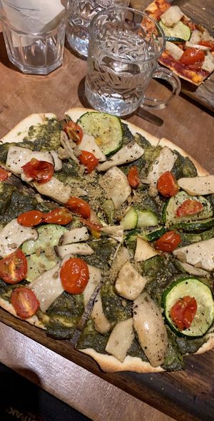Pizza with pesto spread  at Wholey Wonder in Penang