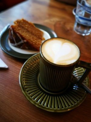 gorgeous vegan marmalade cake and oat milk flat white at The Moon and Sixpence in Cockermouth