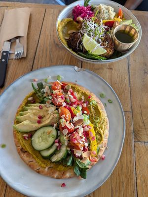 Hummus and bread, salad bowl with falafel and quinoa at ROOS Taste and Smile in Leiden