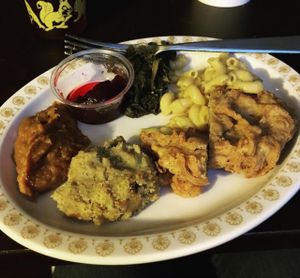 Clockwise from top: cranberry sauce, greens, mac and cheese, chick'n, dressing, sweet potatoes. All delish! at The Southern V in Nashville