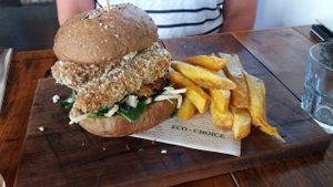 Herb and tempeh burger with chips - amazing at Punnet Eatery in Hamilton
