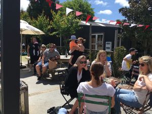 Outdoor seating next to the children’s pay area  at Punnet Eatery in Hamilton