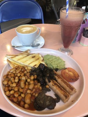 Vegan breakfast, oat latte and beet & ginger juice   at Nibble Cafe in Manchester