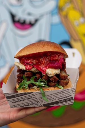 Chicken burger with home made vegan feta cheese, roasted paprika and Chili Sauce! at Lia's Kitchen in Berlin