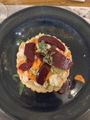 Antipasto: Crostatina con ricotta di anacardi e la nostra giardiniera di stagione  at La Mi Mama in Rimini