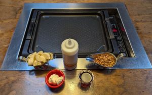vegan and gluten-free pancake batter, pecans, maple syrup, vegan butter, and bananas at Slappy Cakes in Portland