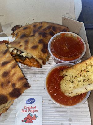 Breadsticks and calzone  at Razzi's Pizzeria - Howell St in Seattle