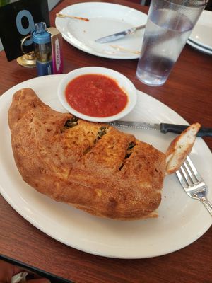 Calzone-pepperoni, sausage, jalapeño at Razzi's Pizzeria - Howell St in Seattle