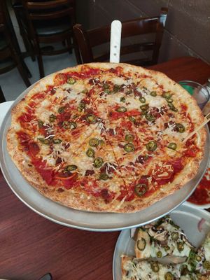 Large pizza - pepperoni, sausage, jalapeño at Razzi's Pizzeria - Howell St in Seattle