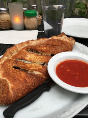 Build-your-own calzone. Easily serves two people.  at Razzi's Pizzeria - Howell St in Seattle