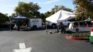 The Information Booth & Entertainment at Farmer's Market - Midtown in Ventura