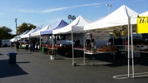 Another Row if Vendors at Farmer's Market - Midtown in Ventura