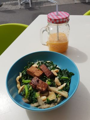 Smoothie and bowl of the day - white rice, tofu, kale and mushrooms. at La Ola Verde in Lanzarote