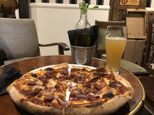 Vegan BBQ pizza with alcohol free beer  at Graciarnia in Wroclaw