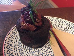Chocolate and berry cake with fantastic icing.  at Grindz Cafe in Tauranga