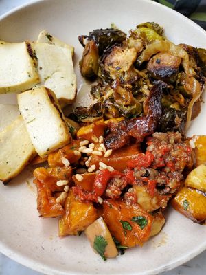 Tofu with 2 sides (Brussel sprouts and sweet potatoes) at Flower Child - The Domain in Austin