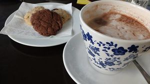 great vegan hot chocolate and cookies! at Poffers Cafe in Stuttgart