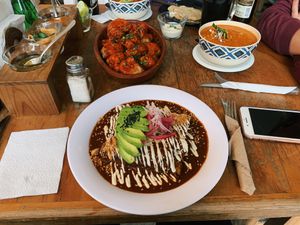 Cauliflower wings, tortilla soup, enmoladas. Wow so delicious and rich. at La Flaca - Americana in Guadalajara