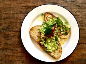 Vegan avo toast w/ lime, coriander and chilli on sourdough. at Exchange Coffee Shop & Kitchen in Bristol