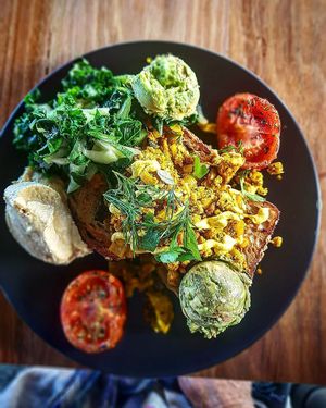 Scrambled Tofu, Tomatoes, Greens, Avo and Hummus  at Onda Food House in Aireys Inlet
