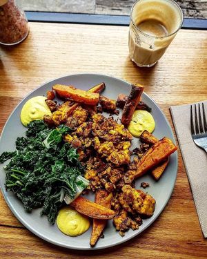 Cajun Scrambled Tofu, Sweet Potato Chips and Greens with Cashew Hollandaise  at Onda Food House in Aireys Inlet