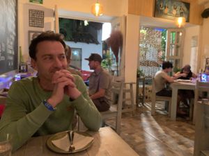 View to the street from inside.  Someone is being very mischievous....  at Veggitalia in Puerto Vallarta