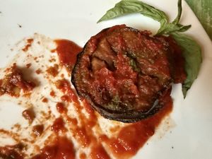 Eggplant dish with red sauce and pesto it melted in my mouth  at Veggitalia in Puerto Vallarta