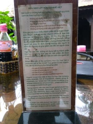 Explanation that they don't use cows milk only brown rice milk at Ngu Ha Garden Vegetarian Restaurant in Hue