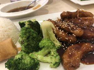 Sesame "Chicken" served with white rice, spring roll, and broccoli.  at VeGreen in Duluth