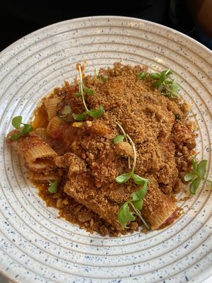 Rigatoni with a delightful sauce and gluten free breadcrumbs at Plants by Deliciously Ella in London