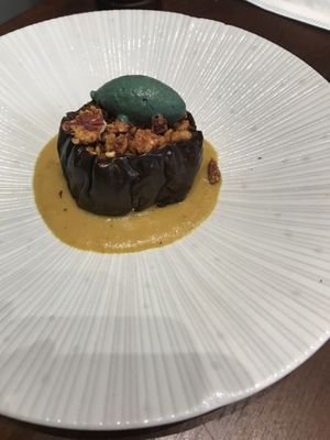 Small plate aubergine with candied nuts, pistachio cream and yellow curry sauce - so flavourful!  #Veganuary at Plants by Deliciously Ella in London