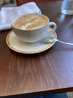 Oatmilk Turmeric latte  at Plants by Deliciously Ella in London