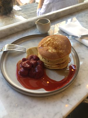 Vanilla pancakes with roasted strawberries and maple syrup   at Plants by Deliciously Ella in London